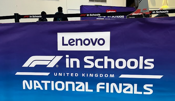 Blue gradient sign with white text, which reads 'Lenovo F1 In Schools, United Kingdom, National Finals'